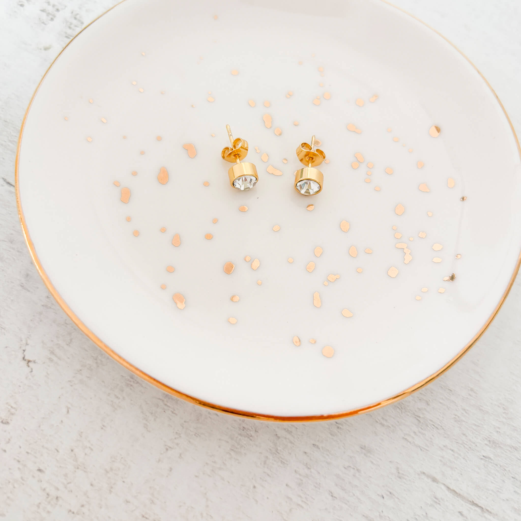 Topos Zircón Baño en Oro