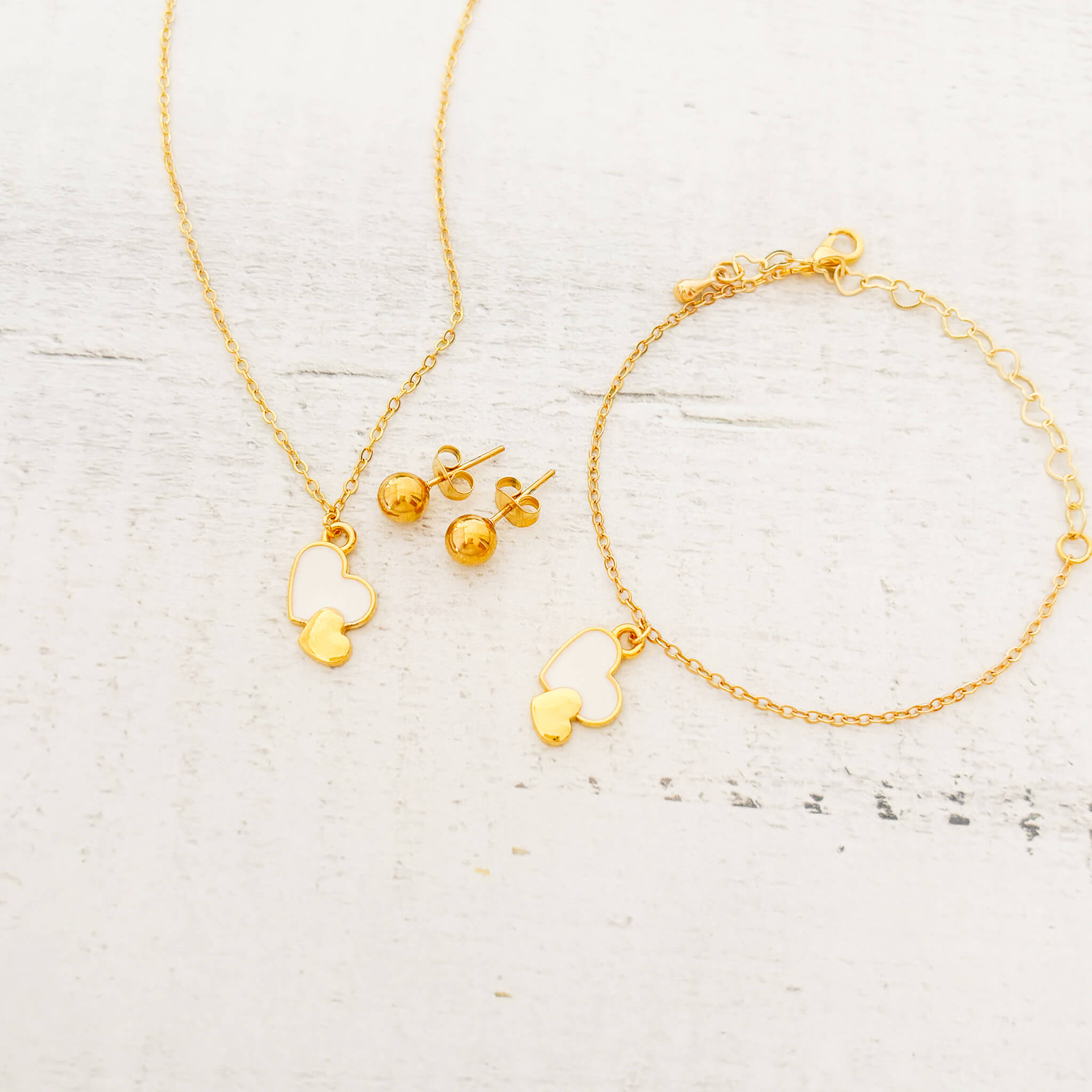 Set Cadena 2 Corazones Blanco-Dorado + Pulsera 2 Corazones Blanco-Dorado + topos